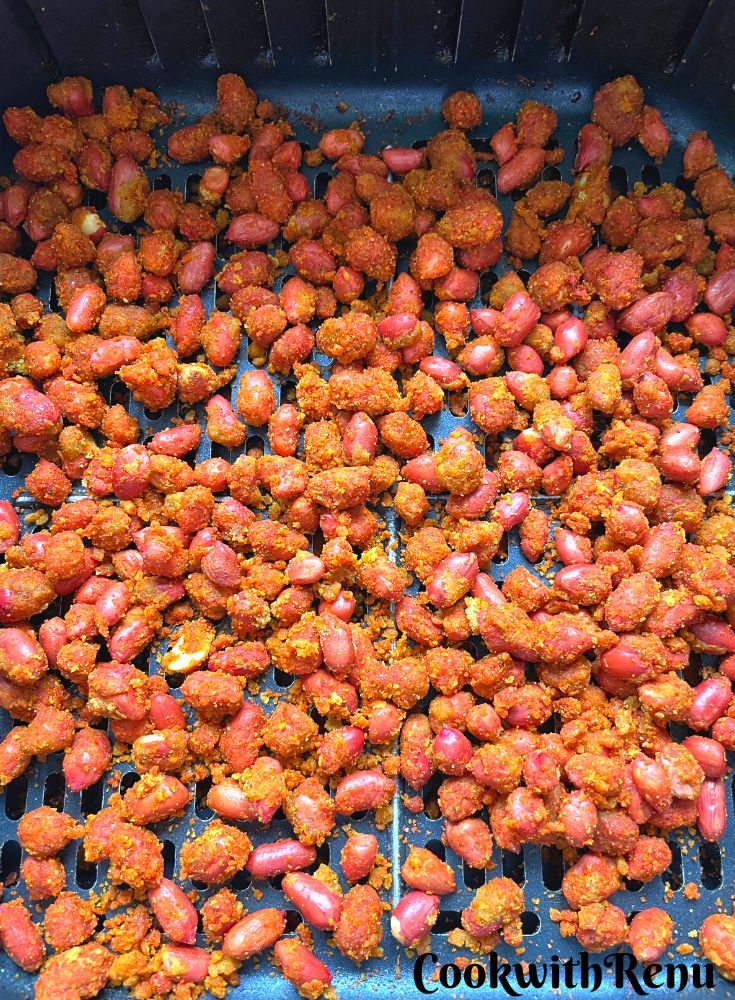 Spiced Peanuts ready to be baked in air fryer.