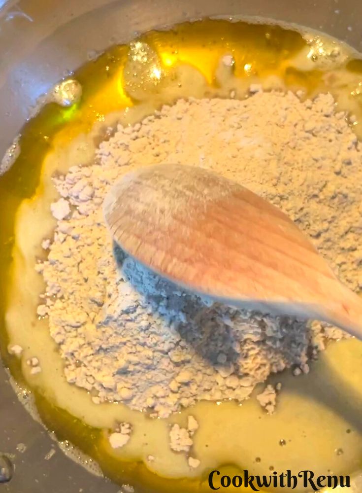 Add Bajra Flour in Ghee.