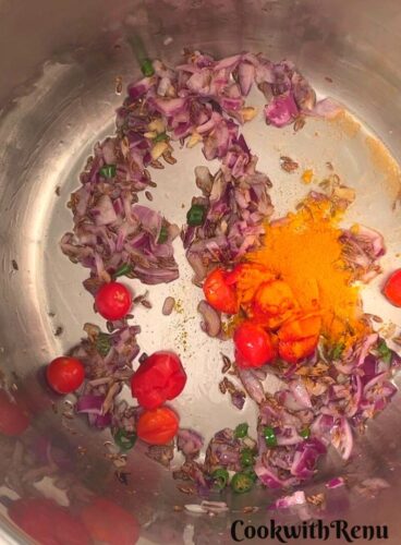 Adding of Tomatoes and Turmeric.