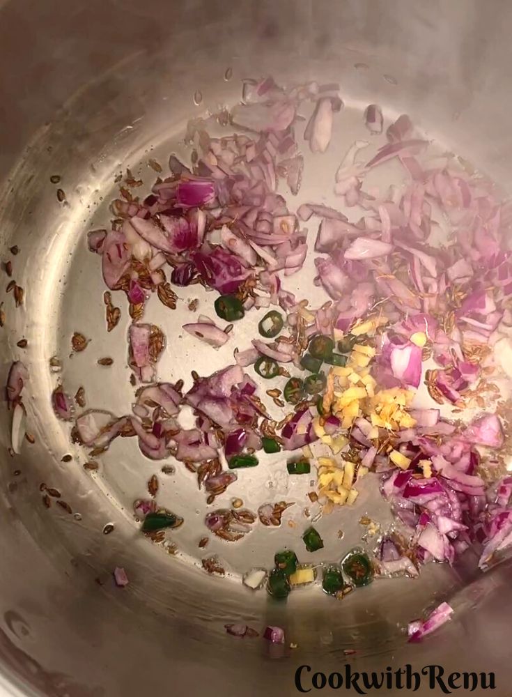 Adding of green chili and ginger.