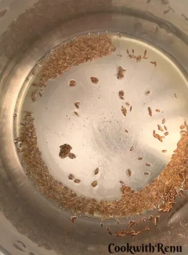 Tempering of Cumin seeds in Oil.