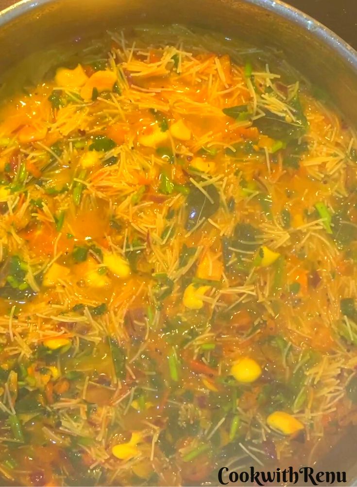 Adding Vermicelli in boiling mixture.