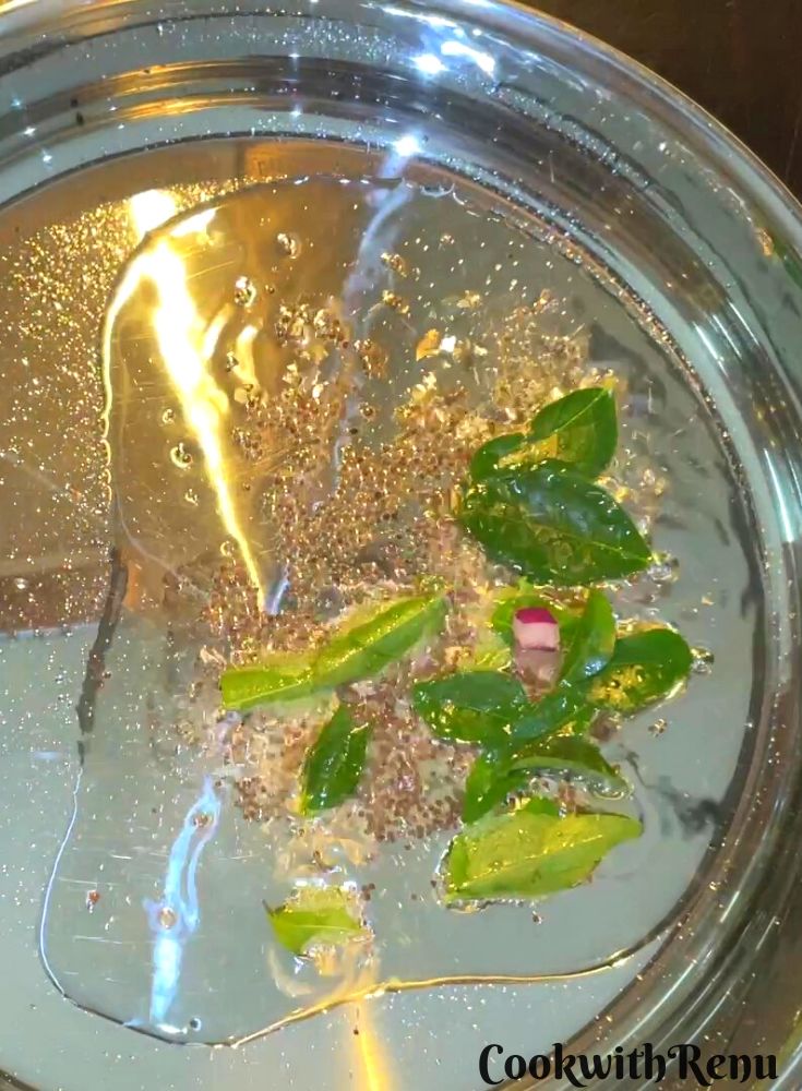 Curry leaves added in oil.