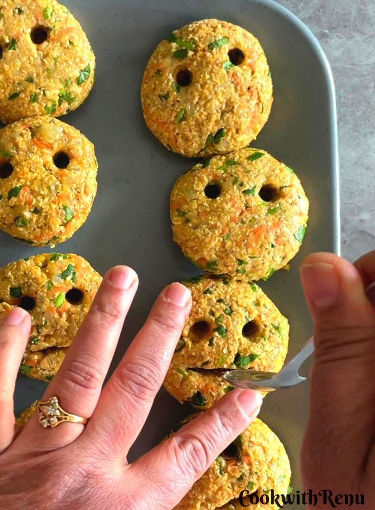 Adding a face to the smiley using a spoon.