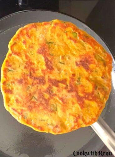 Cooked Bajra Chives paratha.