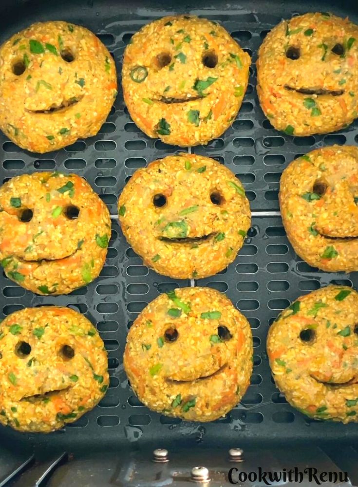 Potato and Oats Smiley ready to be baked in an air fryer.