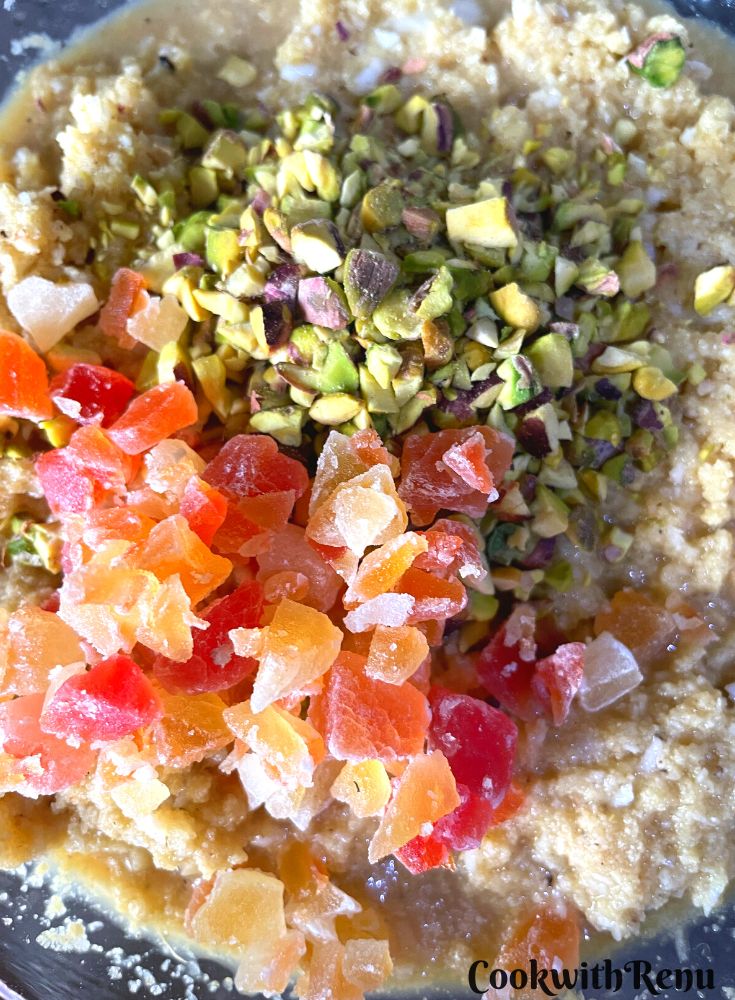 Chopped raw papaya and chopped pistachio ready to be added to Baath Cake