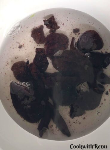 Soaked Kokum in a white bowl.