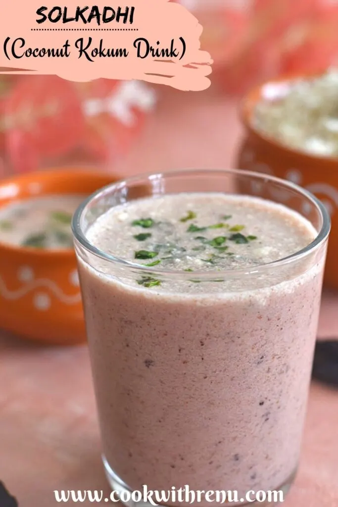 Close-up look of Solkadhi or Kokum coconut curry in a glass.