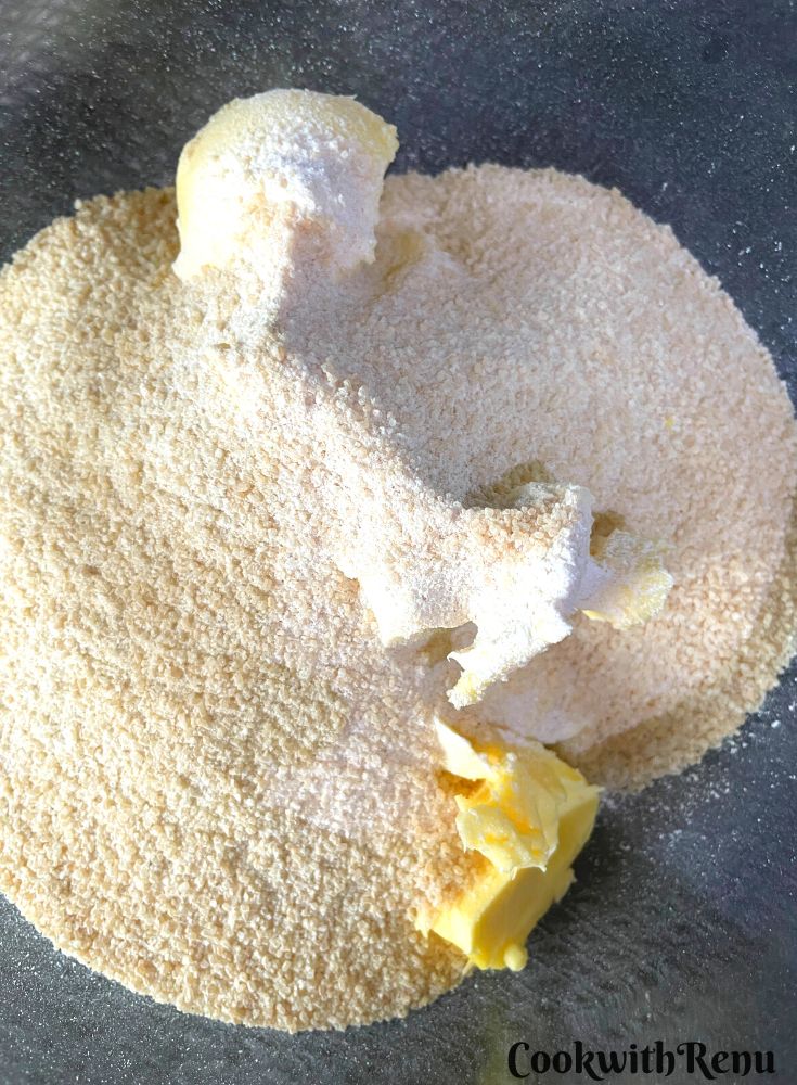 Sugar and Butter are ready to be whipped in a bowl.