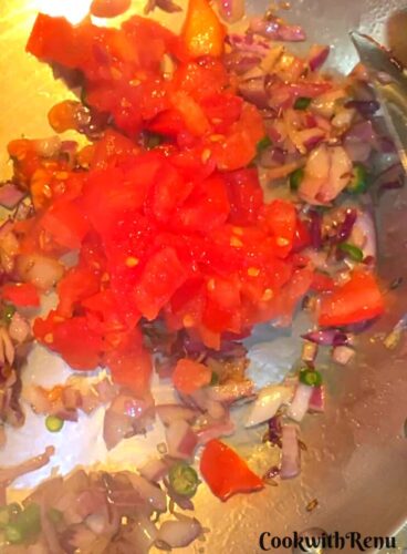 Tomatoes added to mixture.