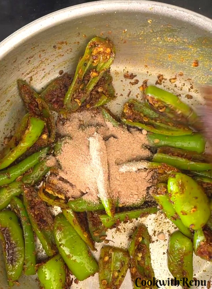 Amchoor powder is added to Mirchi ke Tipore.