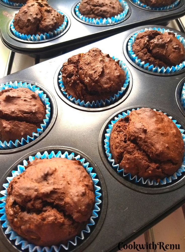 Close-up view of Baked Chocolate Avocado Banana Muffins in a muffin tray.