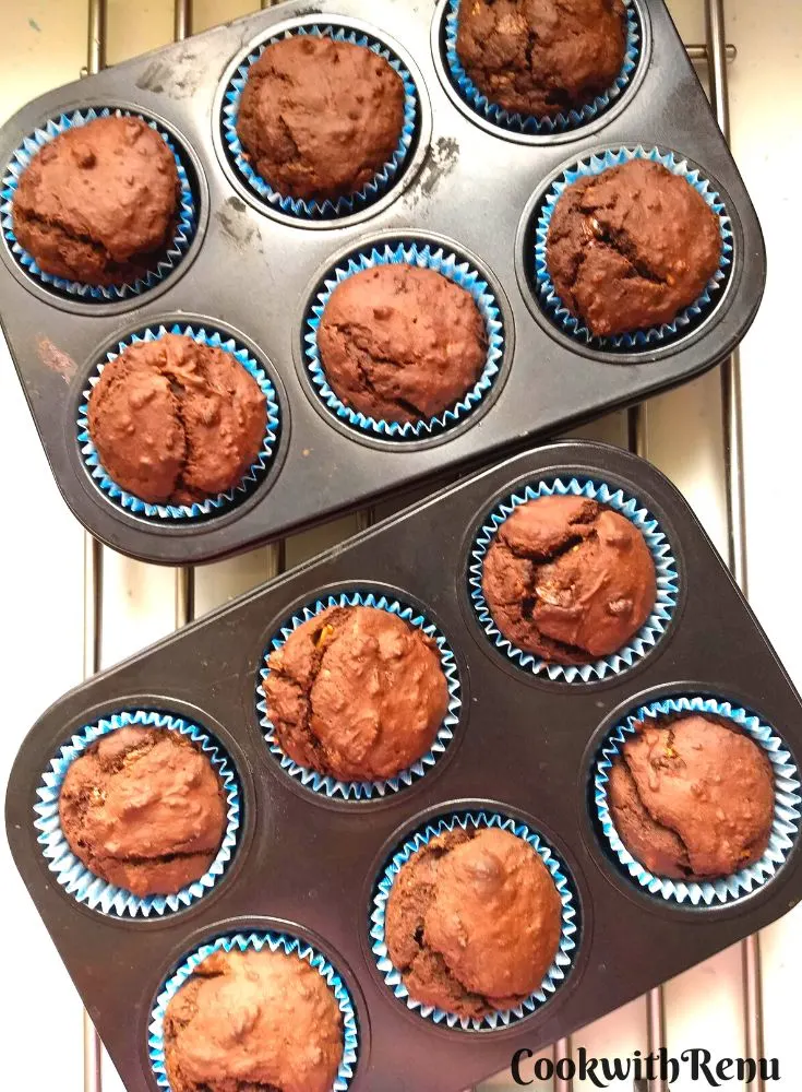 Top view of Baked Chocolate Avocado Banana Muffins in a muffin tray.