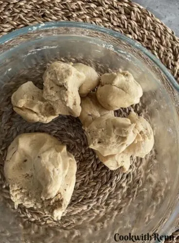 Dividing dough into equal size balls