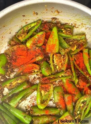 Red chili powder added in chilies.