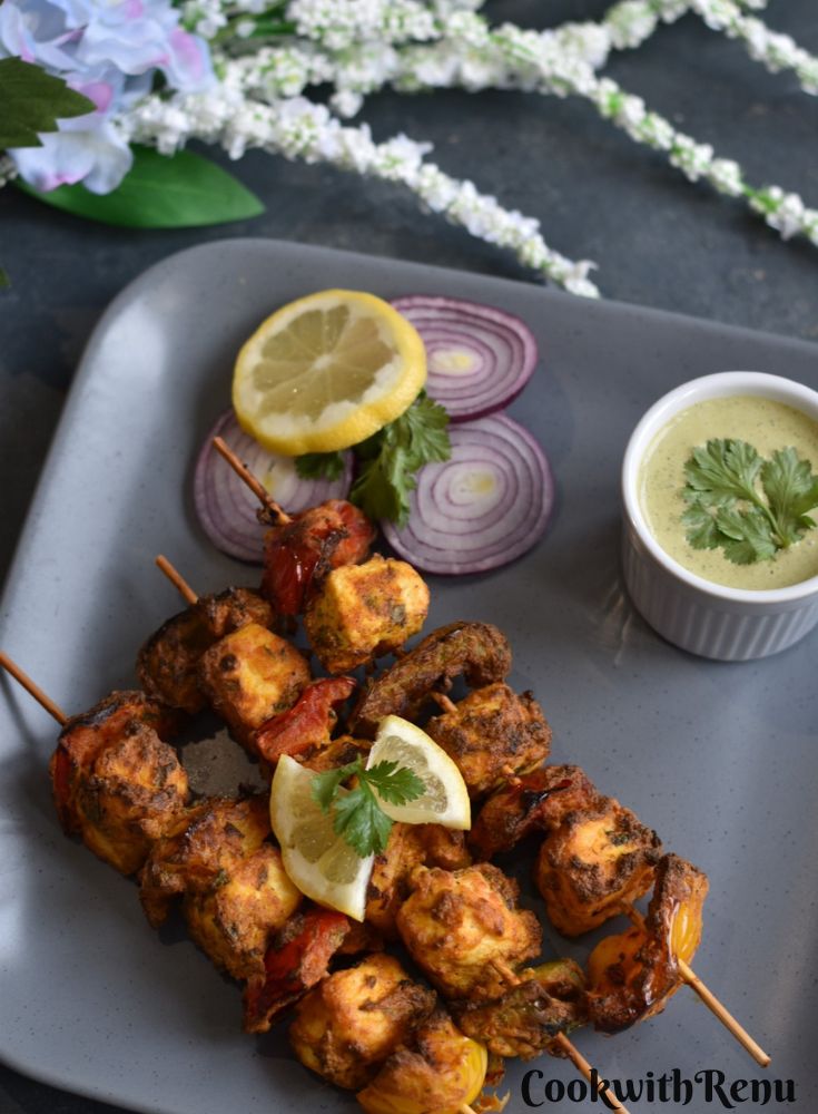 Paneer Tikka is a very popular Indian Style party appetizer made with cubes of tofu marinated in a yogurt and spice mixture. For Vegans, paneer can be replaced with tofu to make grilled vegan tofu tikka or skewers. 