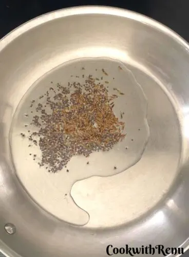Cumin and Mustard Seeds added to oil