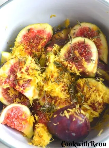 Marinated Fig with lemon zest in a bowl.