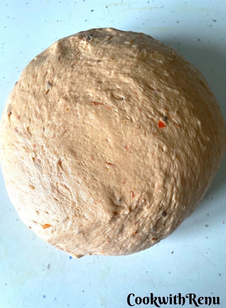 The proofed Dough ready to be shaped into individual balls.