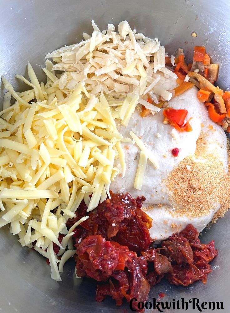 Tomato, Pepper, cheese, salt, garlic added to dough.