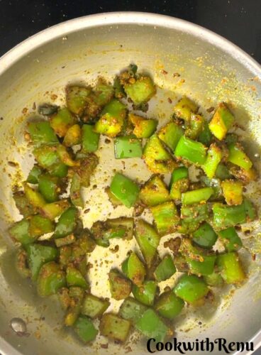 Veggie getting cooked in a pan.