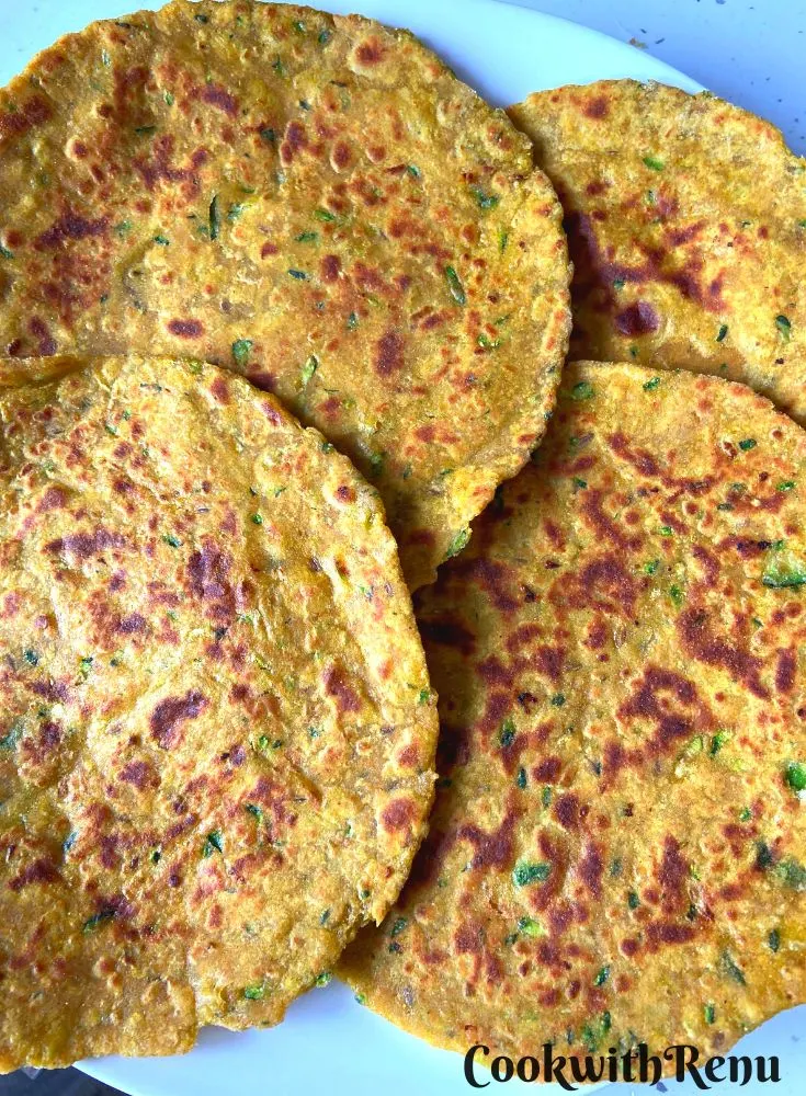 Zucchini or Courgette Paratha on a white plate.