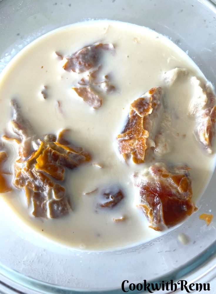 Soaked Dates in milk in a bowl.