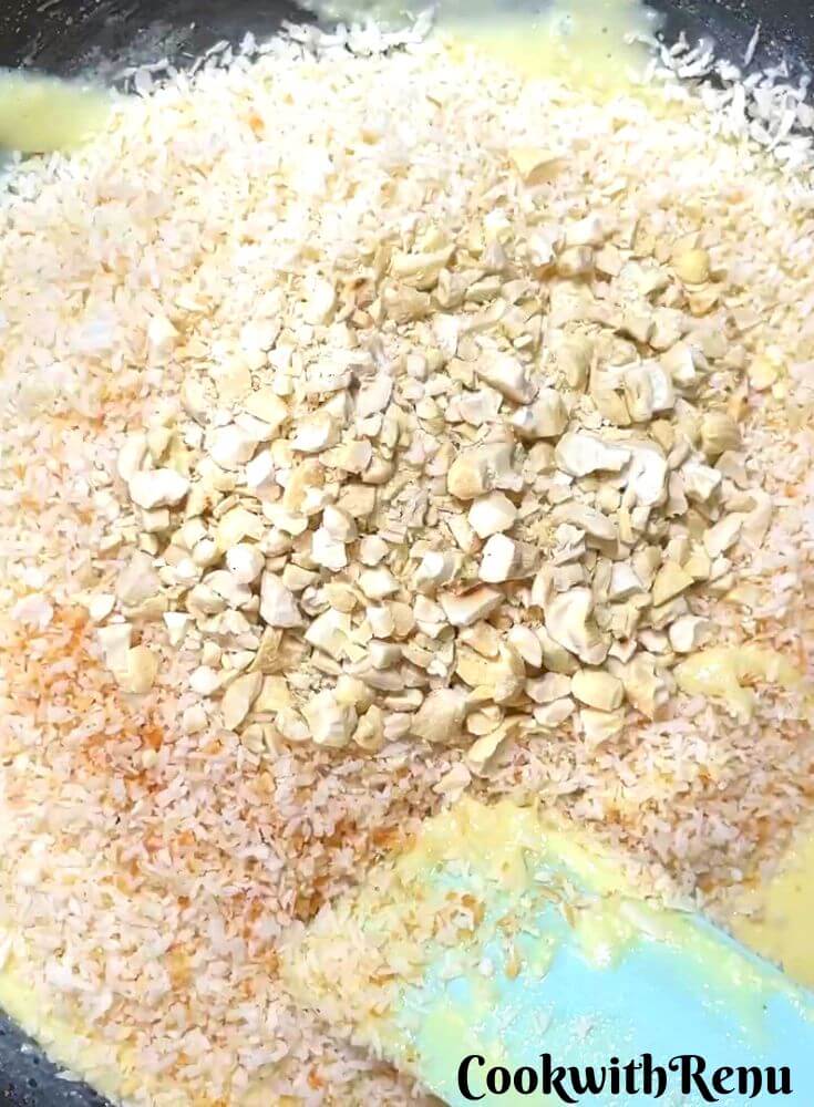 Adding of cashews in condensed milk.