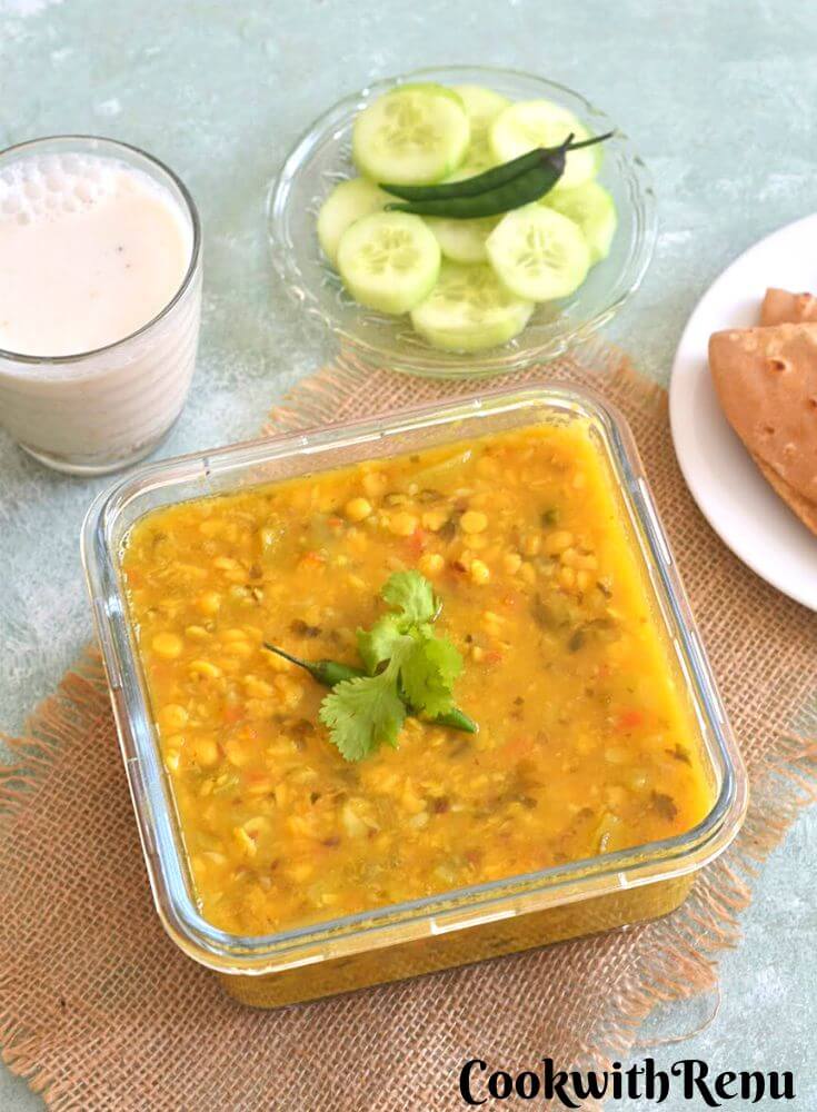 Dudhi Chana Dal served with roti, buttermilk and cucumber