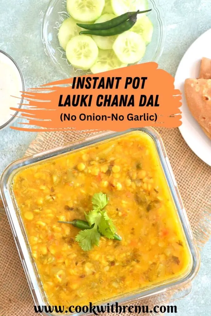 Instant Pot Lauki Chana Dal served in a glass bowl, with roti, cucumber, and green chili.
