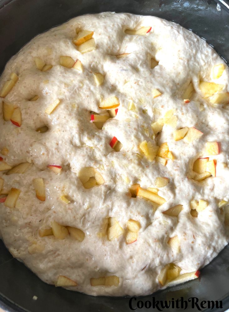 Bread topped with chopped apple.