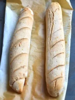 Baked Baguettes on a parchment paper in a baking tray