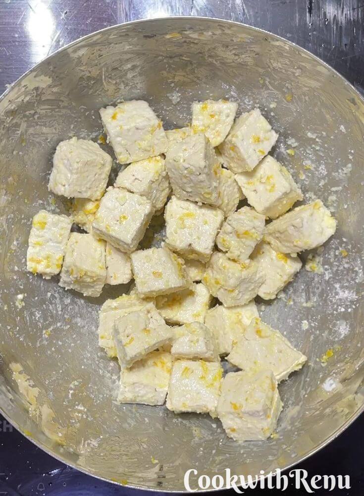 Marinated Tofu in a steel bowl.