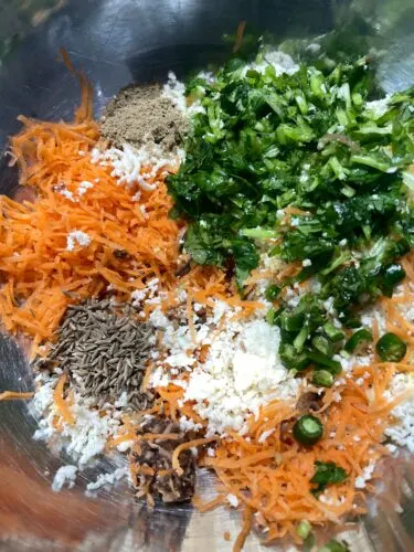 Veggie and spice mixture in a bowl.