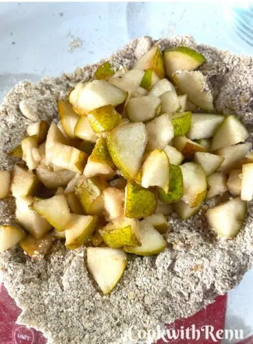 Pear added to dry ingredients.