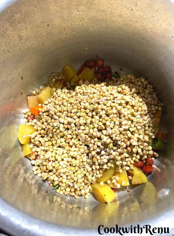 Adding of Kuttu in cooker