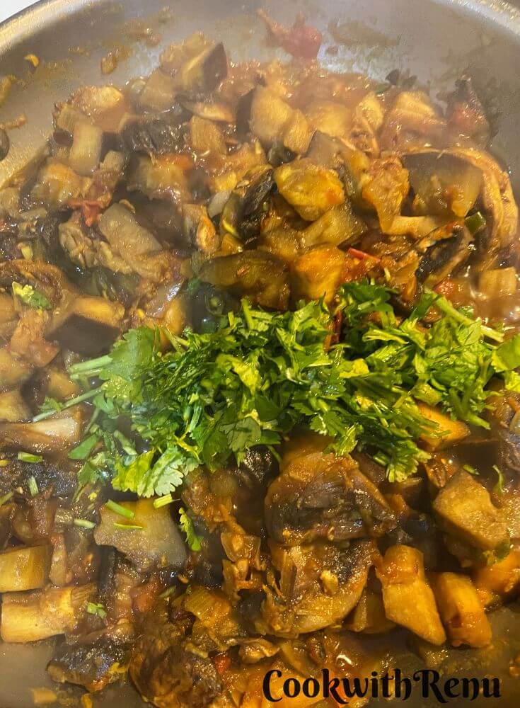 Coriander added to Mushroom Baingan Masala