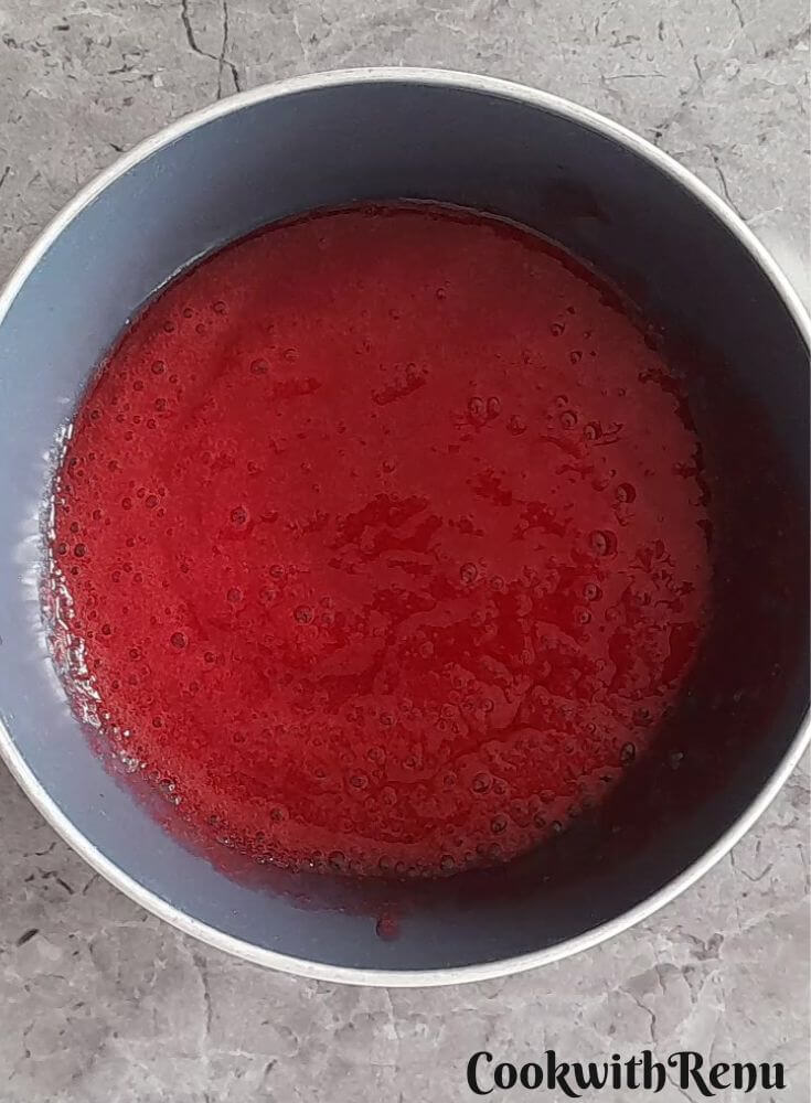 Raspberry Puree in a blue bowl.