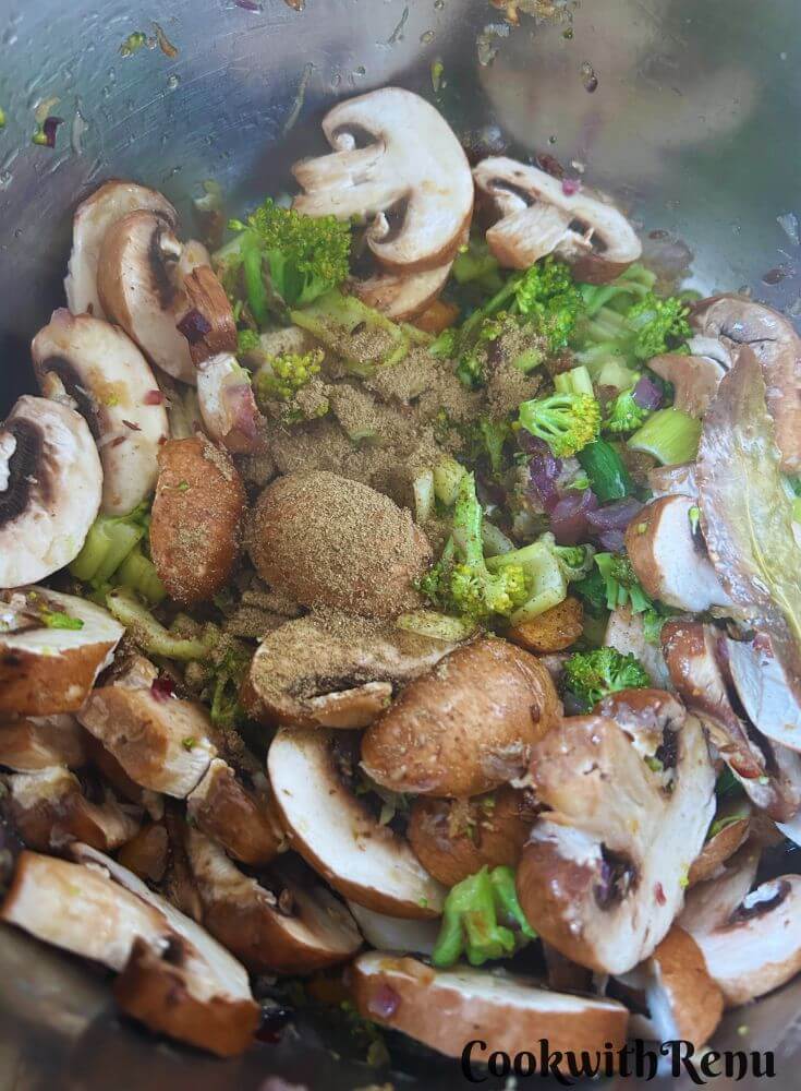 Mushrooms and Garam Masala added to Instant Pot.