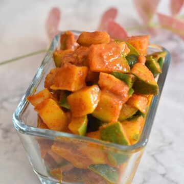 Oil Free Mango Pickle served in a glass bowl.