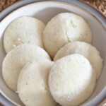 Close up look of Soft Idli served in a bowl.