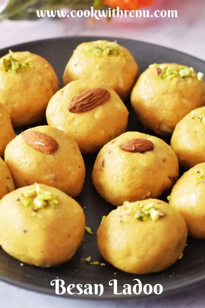 Besan Ladoo arranged in a black plate.