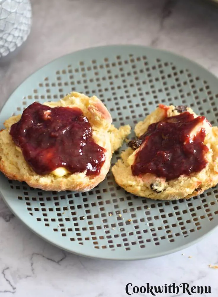 Irish Scones with butter and Jam served in a plate.