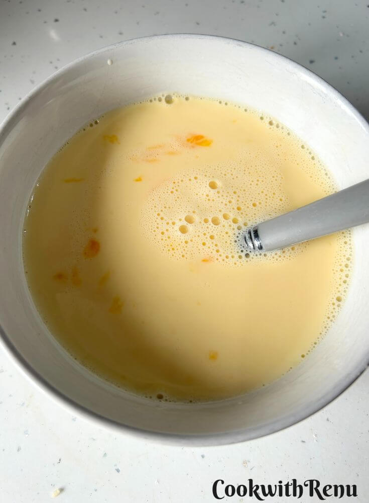 Milk and Egg Mixture in a white bowl.