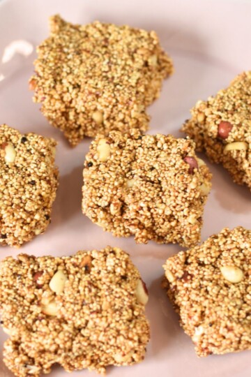 Rajgira Peanut Chikki arranged in a pink plate.