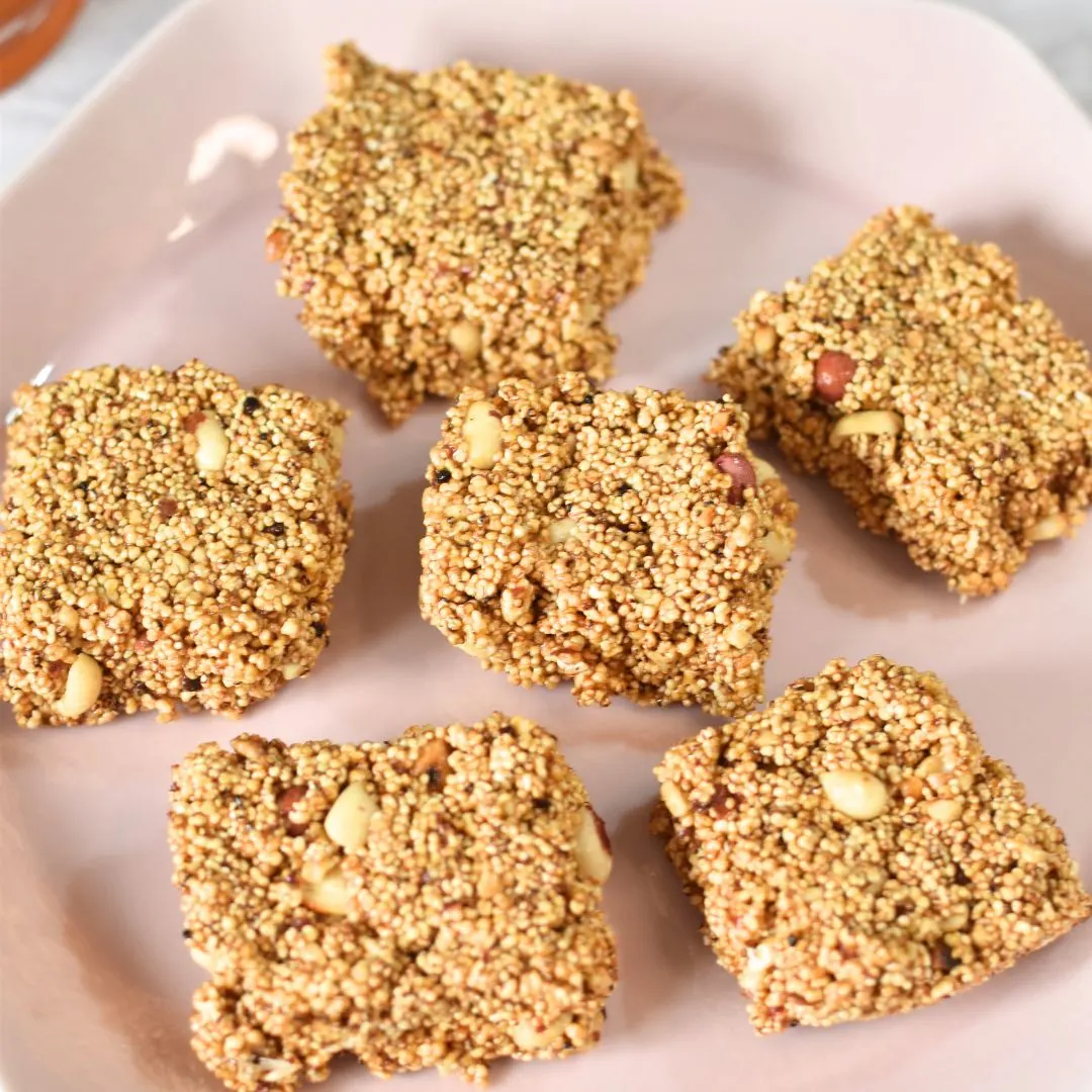 Rajgira Peanut Chikki arranged in a pink plate.