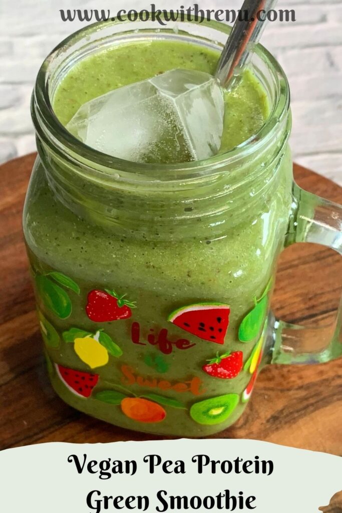 Side view of a Vegan Smoothie served in a glass along with a straw.