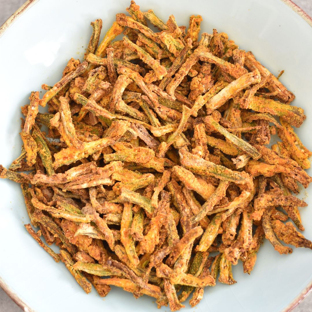 Air Fryer Bhindi in a light blue bowl.