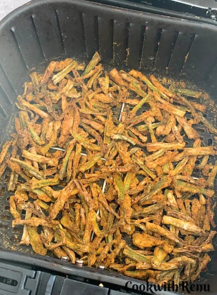 Air Fryer Kurkuri Bhindi in air fryer basket.